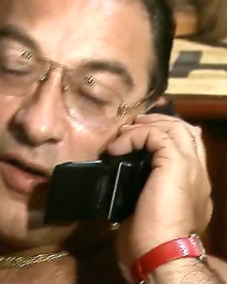 Telephone call will not interrupt what he is doing